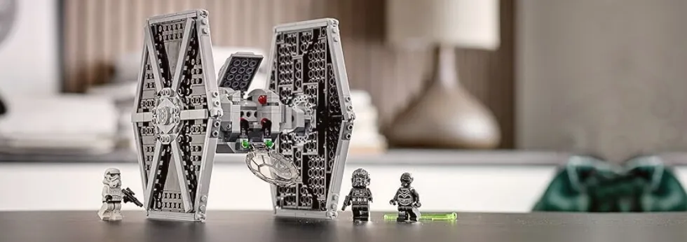TIE fighter with mini figures on the table
