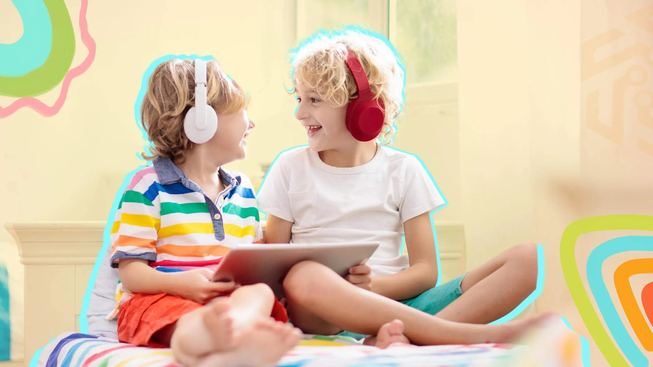 Two kids with tablets and over ear headphones