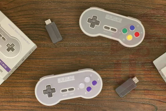 Retro Style Gaming controllers on the desk