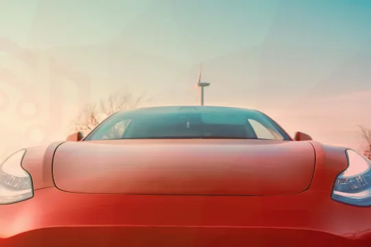 Red tesla at sunset