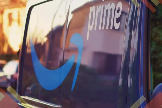 Delivery bus with Prime logo on the side