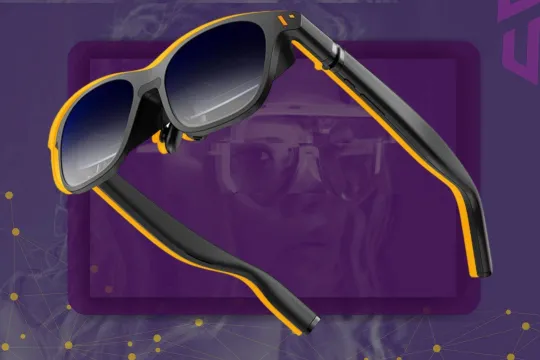 VITURE Pro XR on the dark purple background with young woman silhouette